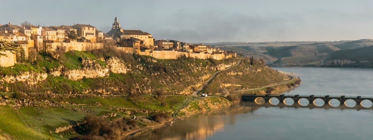 Maderuelo village and bridge over Linares del Arroyo reservoir. Segovia. Spain. Europe.