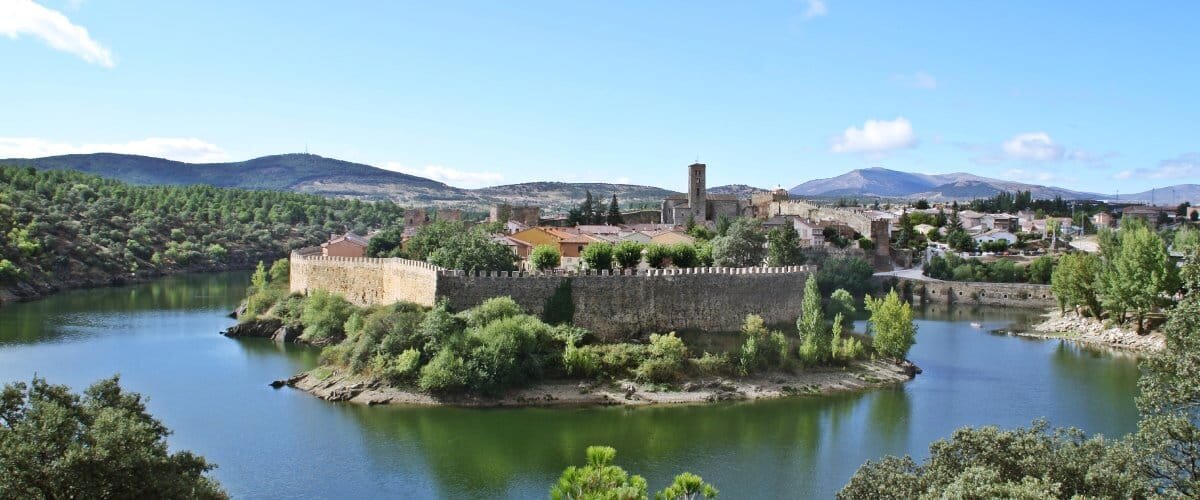 Panoramic of the meander of river Lozoya and the town and fortress of Buitrago de Lozoya in Madrid (Spain).